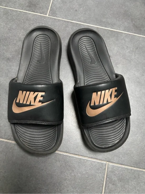Nike Black Slip-On Sandals with Metallic Logo Accent