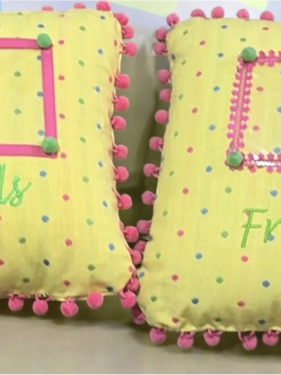 Yellow Polka Dot Accent Pillow with Pink Pom Trim