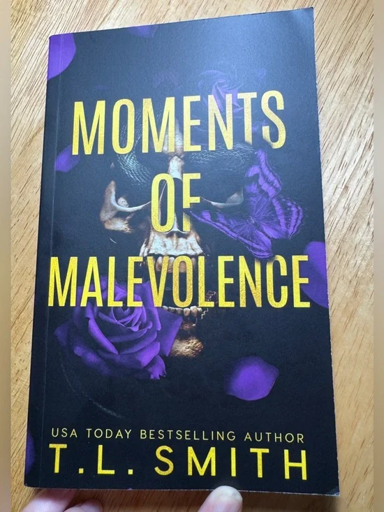 Moments of Malevolence by T. L. Smith