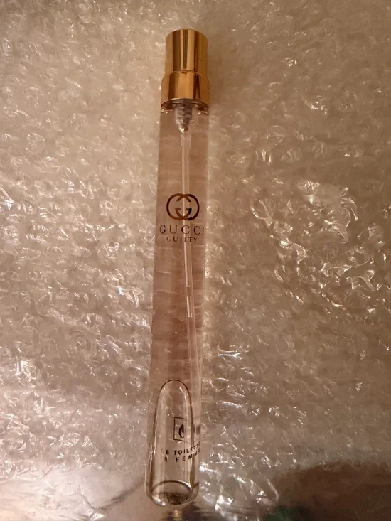 Gucci clear light pink rollerball with gold logo