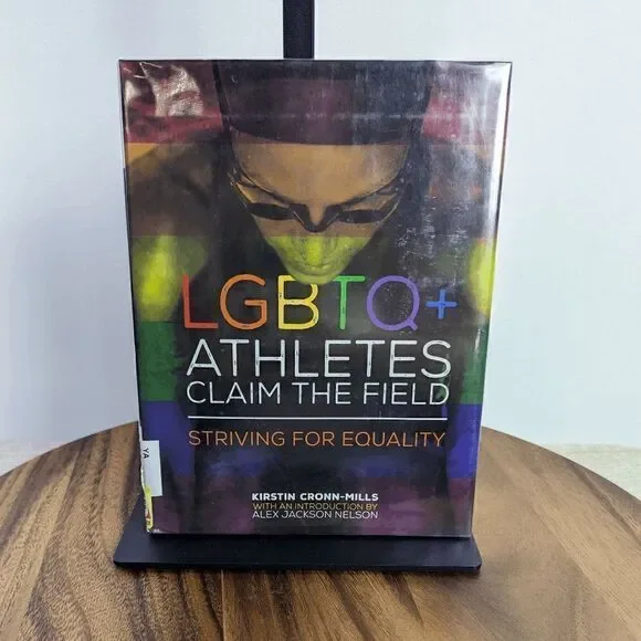 LGBTQ+ Athletes Claim the Field: Striving for Equality Library Binding – August