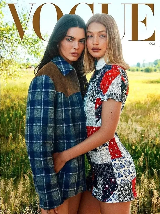 Vogue October 2025 issue featuring models Kendall & Gigi on the cover