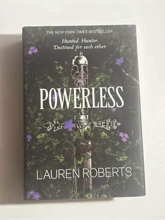 Powerless by Lauren Roberts - Black Cover with Purple Floral Accents