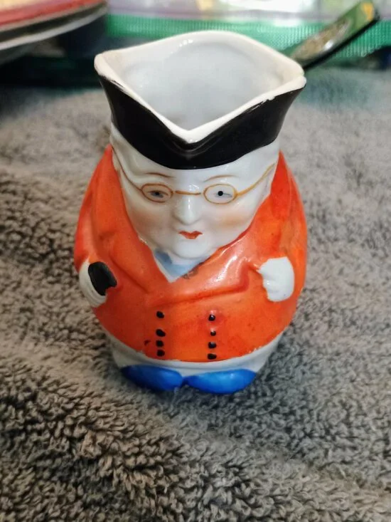 vintage ceramic creamer pitcher styled as a Colonial Man Toby Jug