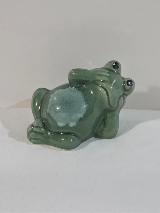 ceramic posing frog figurine