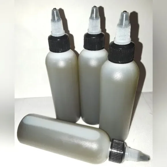 HAND crafted Neem and Amla hair and body oil