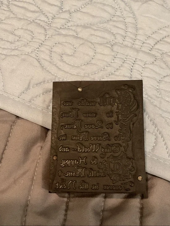 Vintage letterpress printing block.