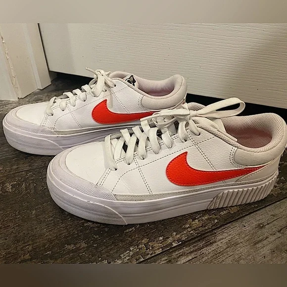 Women’s White and Orange Leopard Nikes sz 7.5 EUC