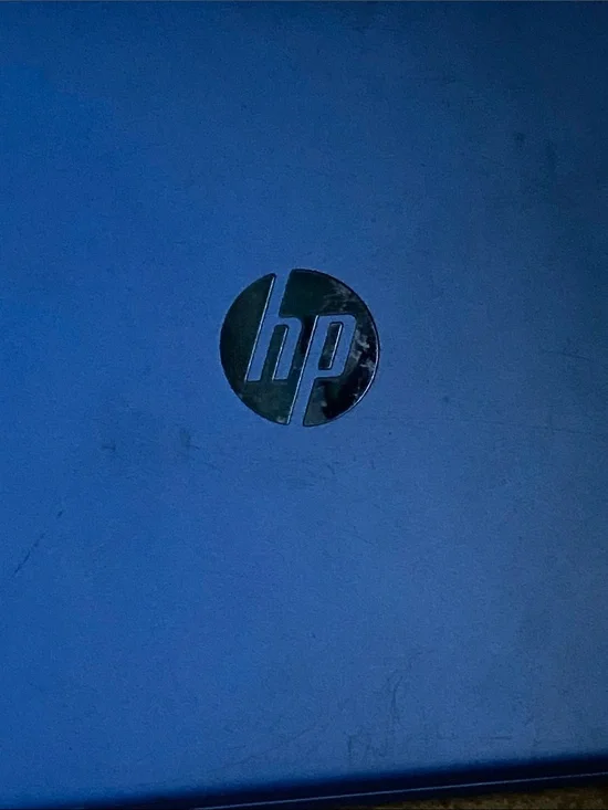 HP Blue Laptop with Silver Logo