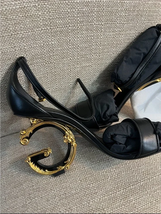 Dolce & Gabbana Black Leather Sandals with Ornate Gold Scroll Heels