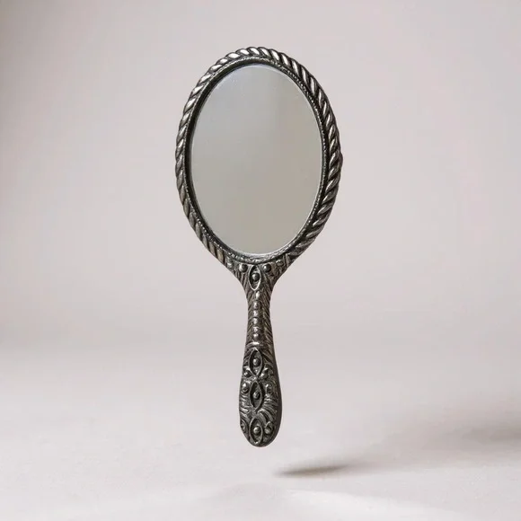 90s antique-inspired Repousse silver-tone 5