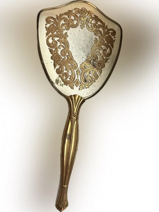 Vintage Gold Tone ornate hand held mirror (call outs reflect price) 13.25 x 6