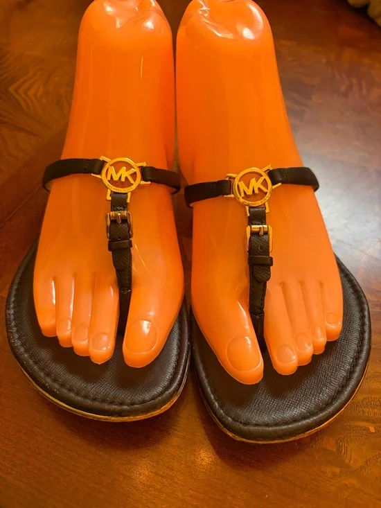 Michael Kors Black Leather T-Strap Sandals with Gold MK Medallions