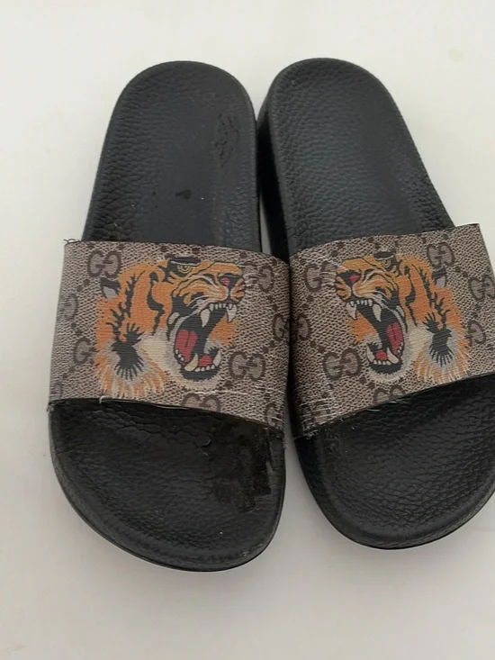Gucci tiger slides size 37/7US women’s runs small worn heavy use in instep outsi