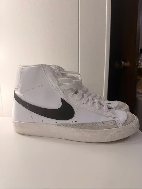 Nike White Sneakers with Black Swoosh