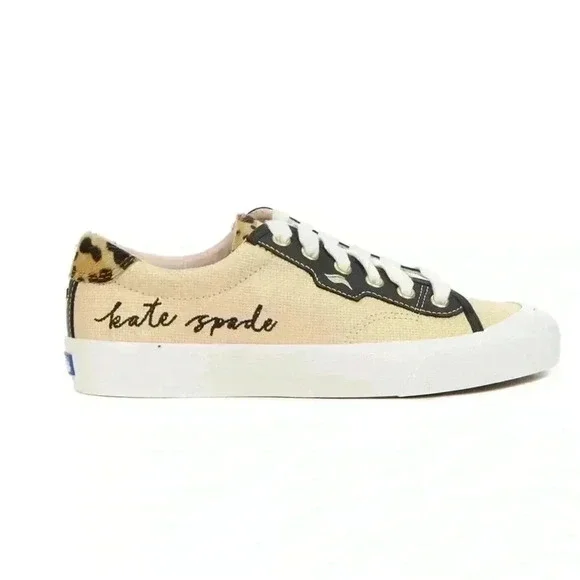 Keds beige canvas sneakers with black trim and leopard heel