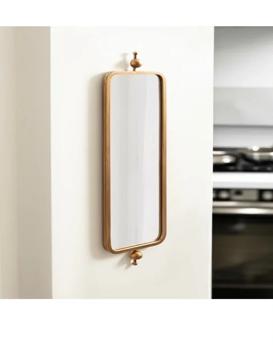 Brass-Tone Rectangular Wall Mirror with Decorative Finials - 9” x 36”