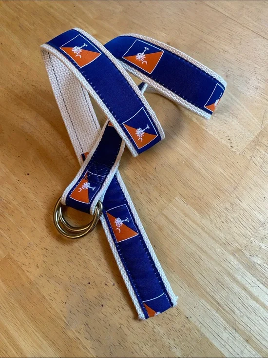 This South Carolina state flag canvas web belt features a distinctive double