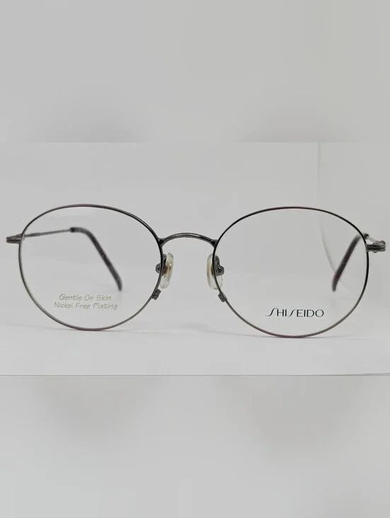 Shiseido 705.  Women's  Round Metal Glasses in Purple Gunmetal. Systech.