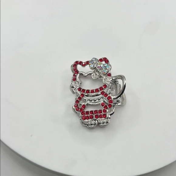 928. Hello Kitty Silver and Red Hair Clip