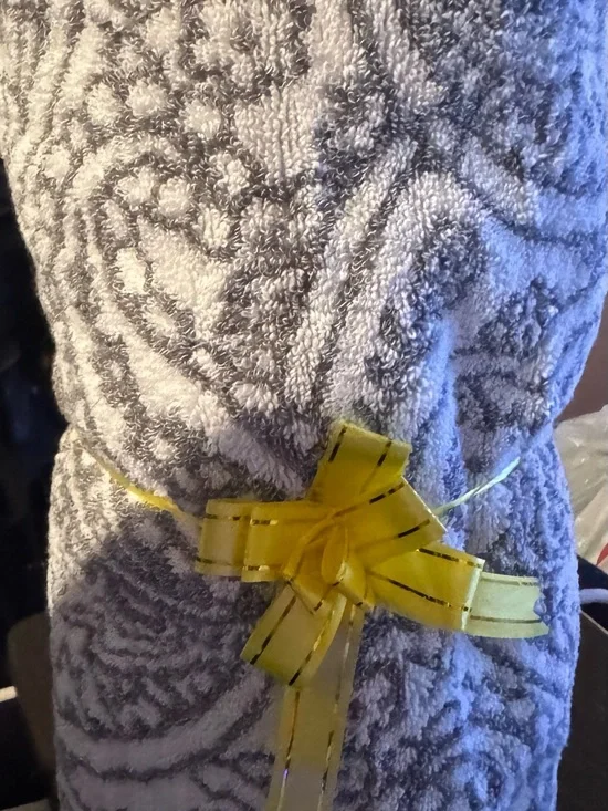 Gray Patterned Plush Towel with Yellow Decorative Bow