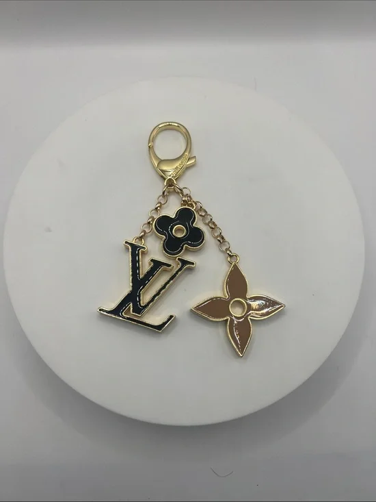 1400. Black & Tan Enamel Charm Bag Chain with Gold Hardware