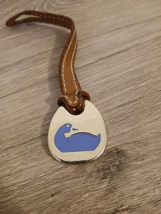 Dooney & Bourke Brown Leather Purse Charm Holder with Blue Duck Medallion Gold