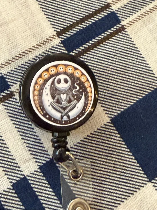 Black Badge Reel with White/Grey Jack Skellington Art