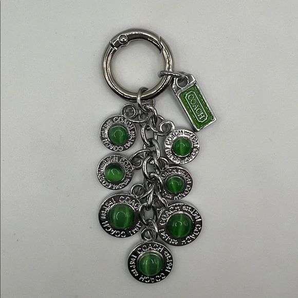 036.Silver and Green Keychain. Box included.