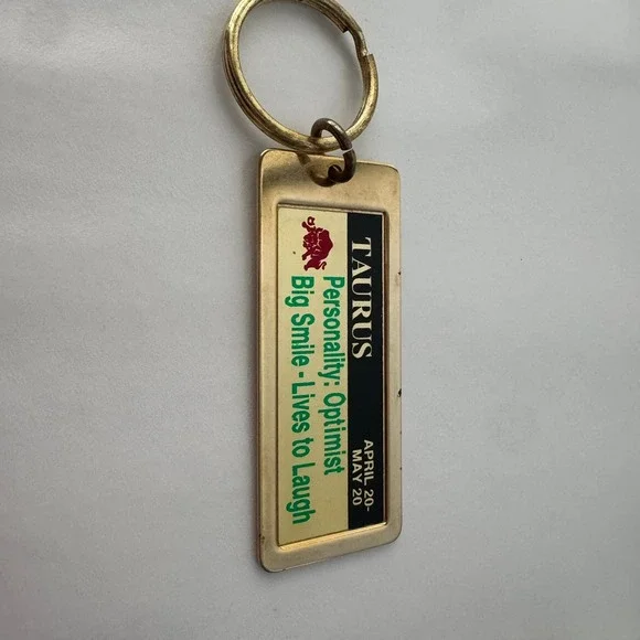 Taurus Zodiac Keychain Astrology Personality Optimist Big Smile‎ Lives to Laugh