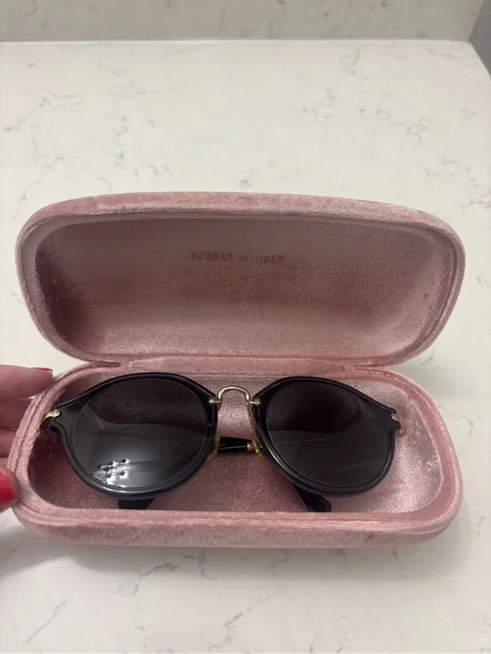 Miu Miu Black Round Sunglasses with Gold Bridge