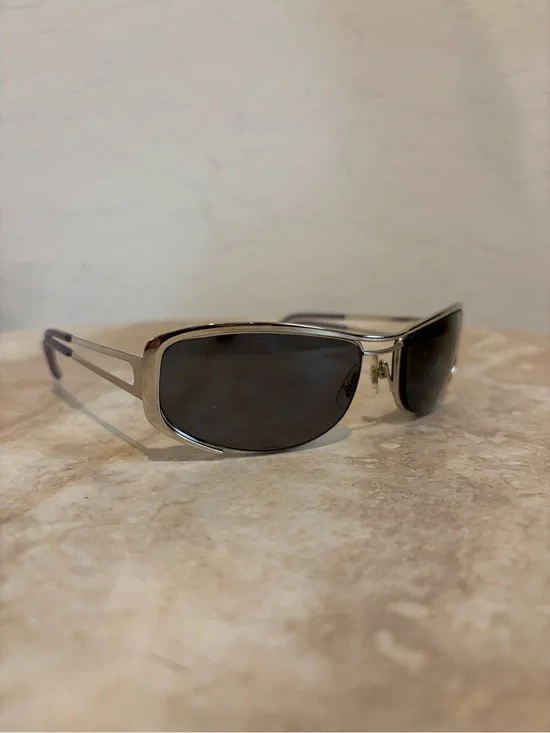 Hiero Elongated Oval Sleek Silver Frame Sunglasses with Dark Lenses