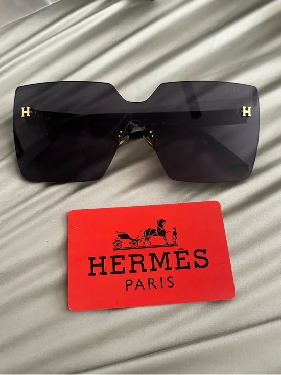 Hermès Women’s Oversized Shield Sunglasses in Black with Gold H Details
