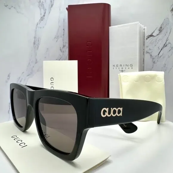 Gucci Black Sunglasses with Gold Logo Accent