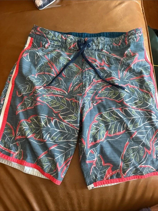 Billabong Blue Tropical Leaf Board Shorts with Red Accents size 29”waist