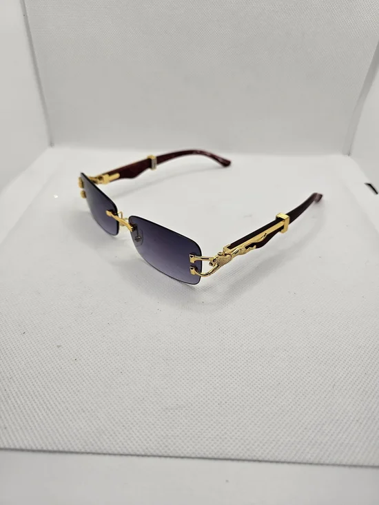 Rimless Women's Sunglasses with Gold Panther Accents and Purple Gradient Lenses