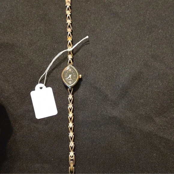 Vintage Avon Womens Quartz Watch Gold Tone Marquise Case Crystal Accents Black