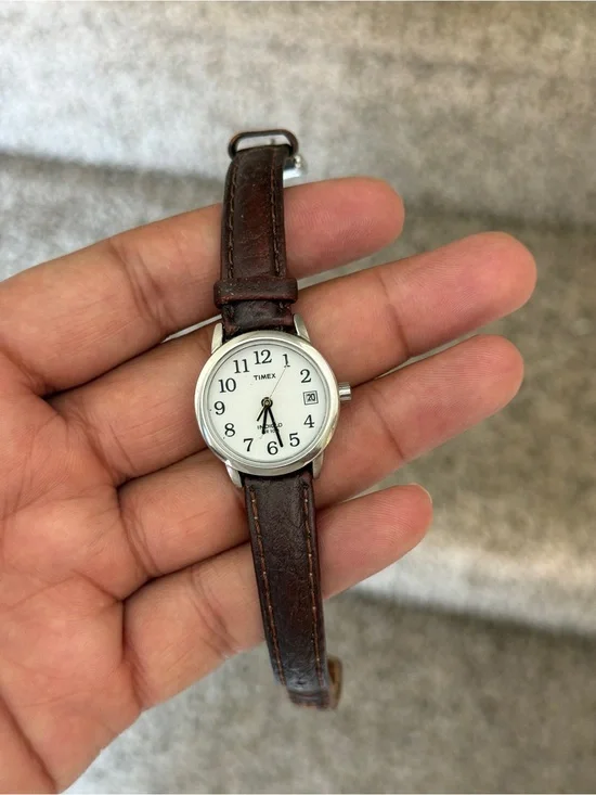 Timex women’s Silver Case White Dial Watch with Brown Leather Strap