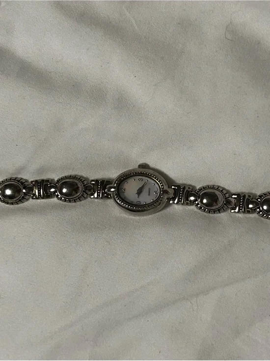 Silver Oval Bracelet Watch with Decorative Links
