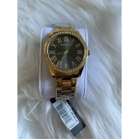Kenneth cole women’s gold watch with little diamonds new battery