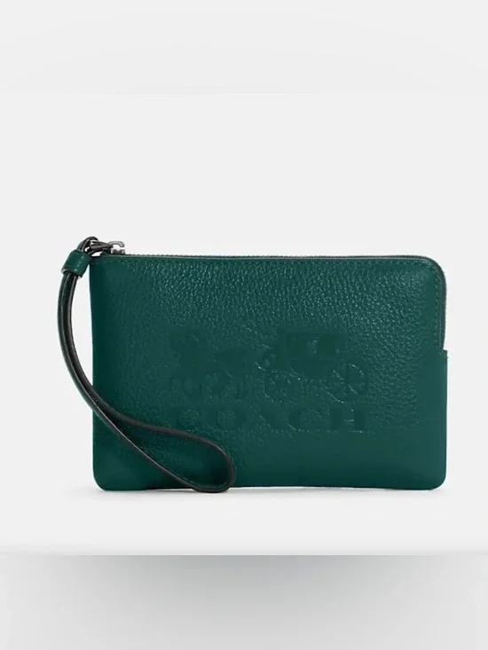 Coach carriage embossed green wristlet leather