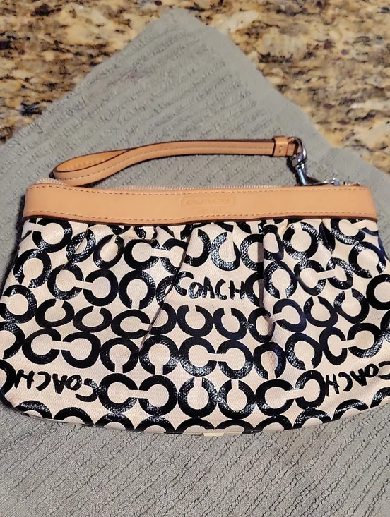 Coach Black and Cream Signature C Canvas Wristlet with Tan Leather Trim