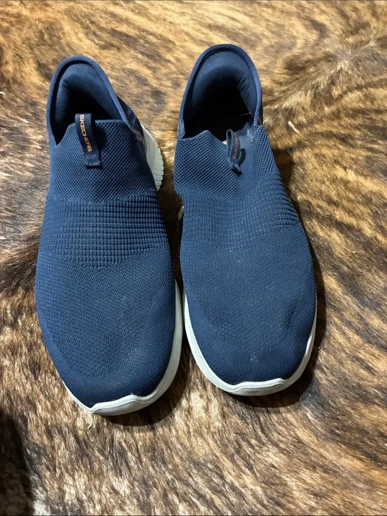 Sketchers men’s blue slip in shoes in size 12.