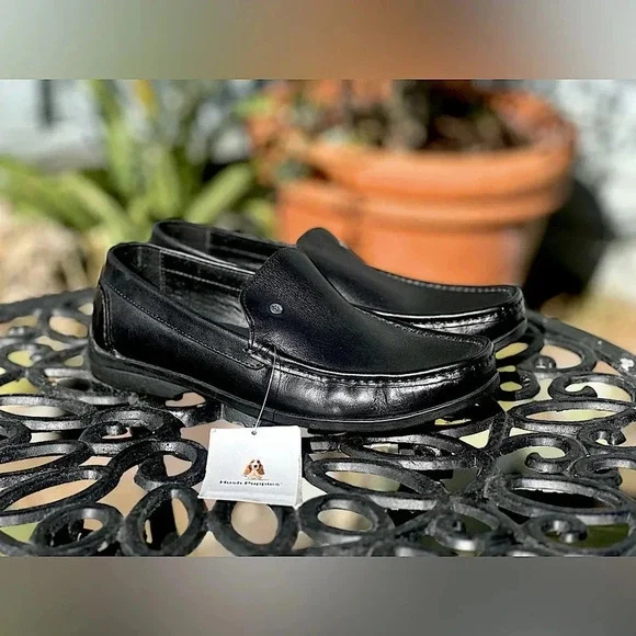 Hush Puppies — Black Leather Loafers