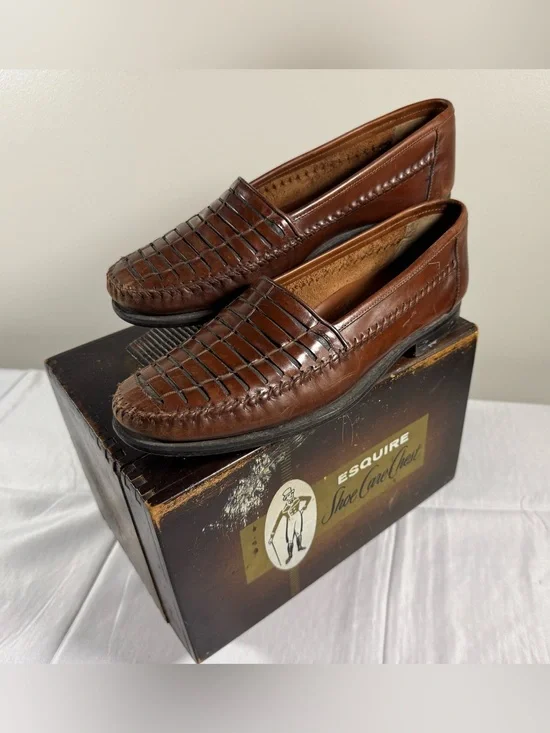 Giorgio Brutini brown leather slip-on loafers featuring a woven design