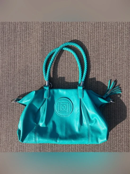 Liz Claiborne teal leather handbag with braided handles and tassel