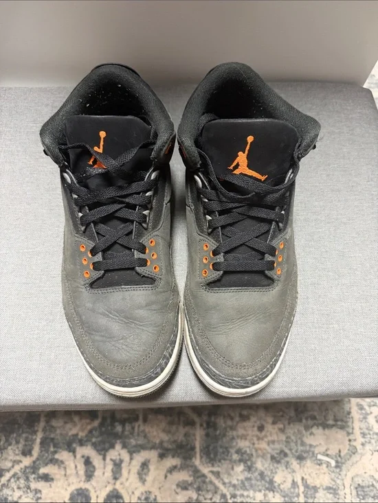 Retro 3 Jordan Men’s Black Sneakers with Orange Jumpman Accents