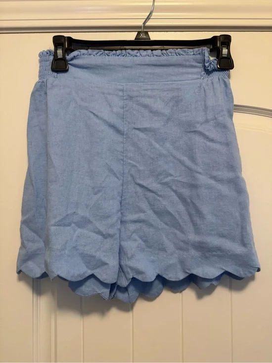 LC Lauren Conrad Super High Rise Smocked Scalloped Shorts in a light blue color