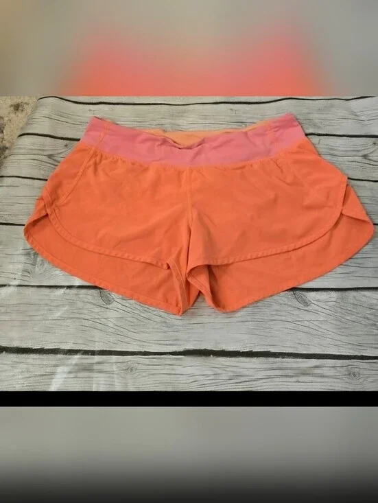 Lululemon Run Speed Shorts Coral Orange Pink Waistband Size 10 Zip Pocket