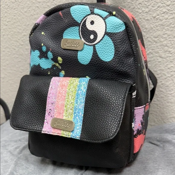 Justice Black Backpack with Multicolor Glitter Stripes
